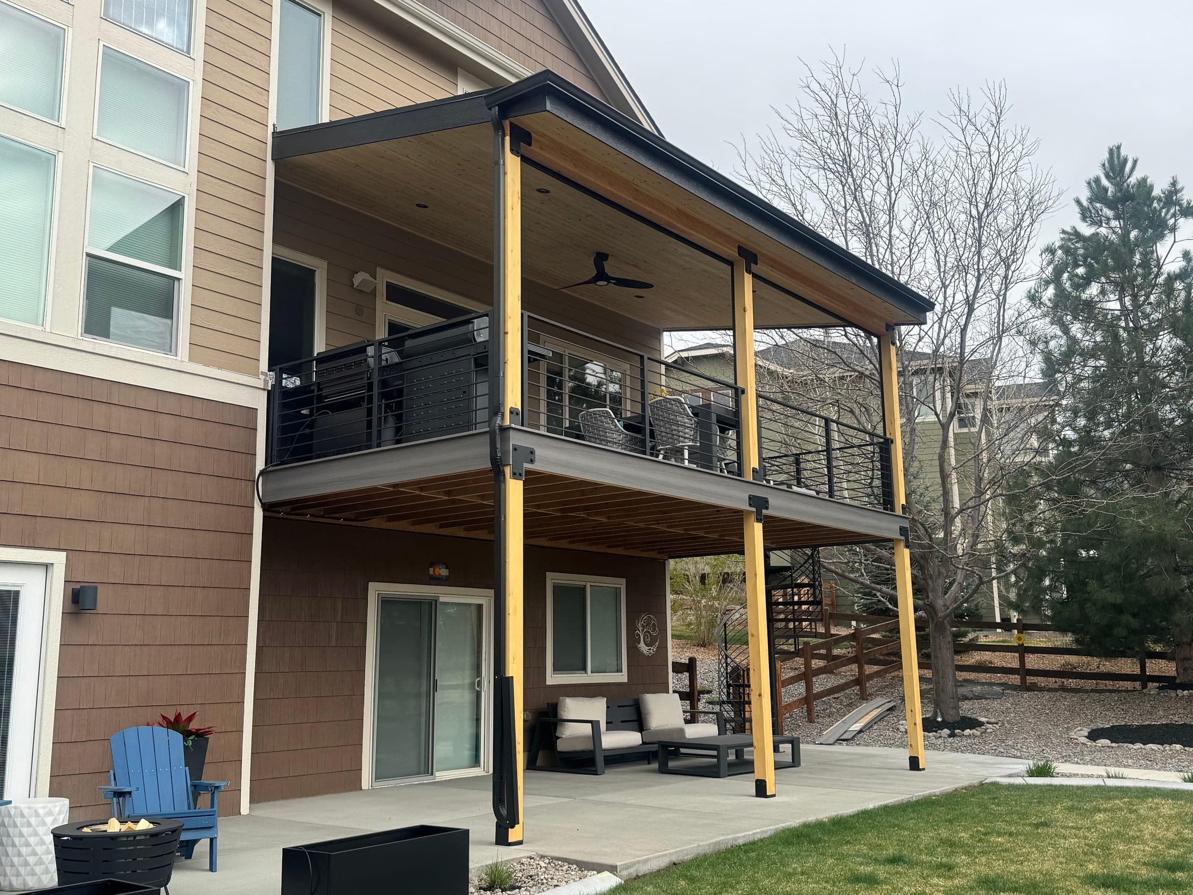 Covered Deck with Spiral Staircase in Greenwood Village, CO — gallery photo 6