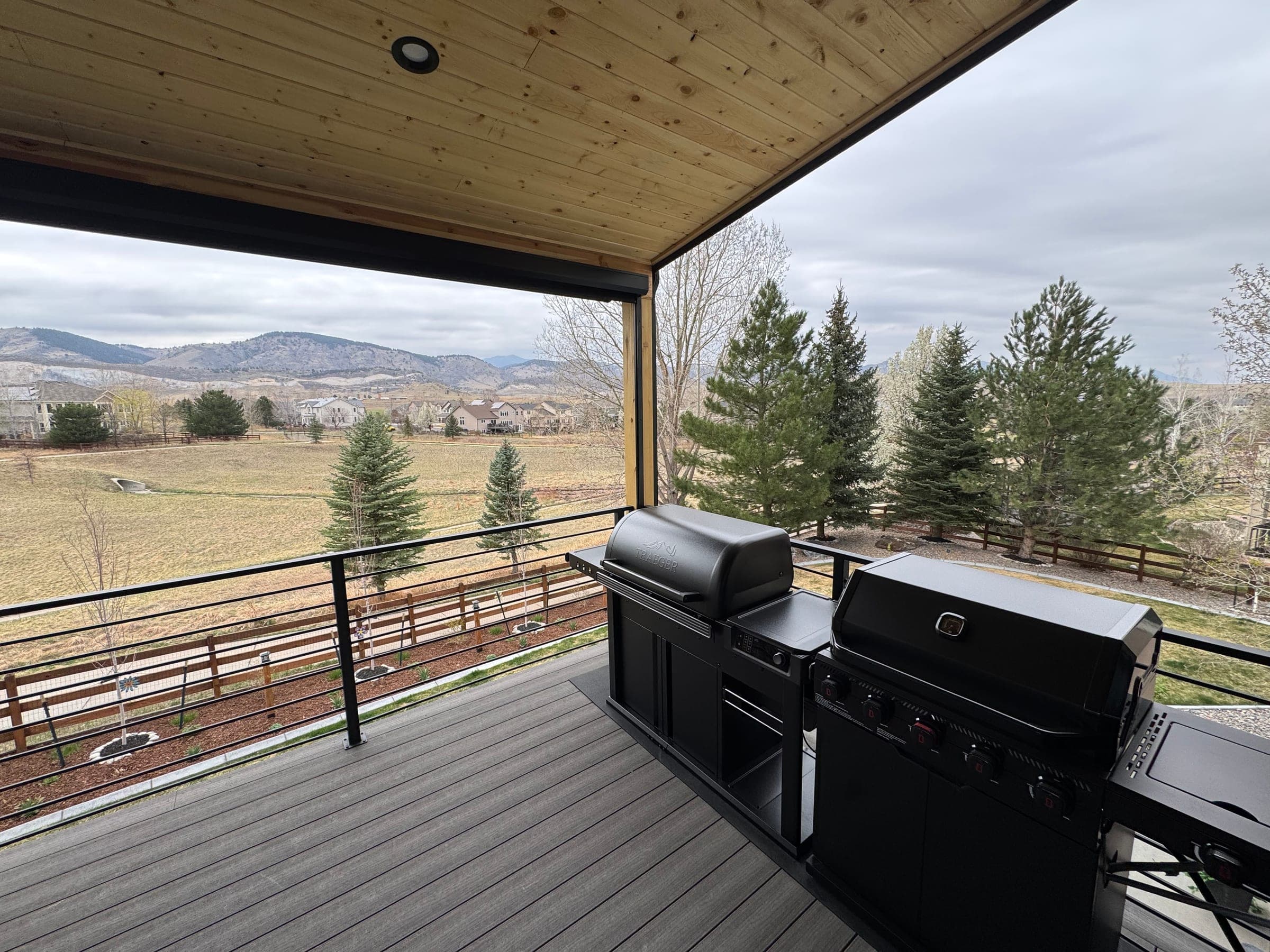 Covered Deck with Spiral Staircase in Greenwood Village, CO — gallery photo 8