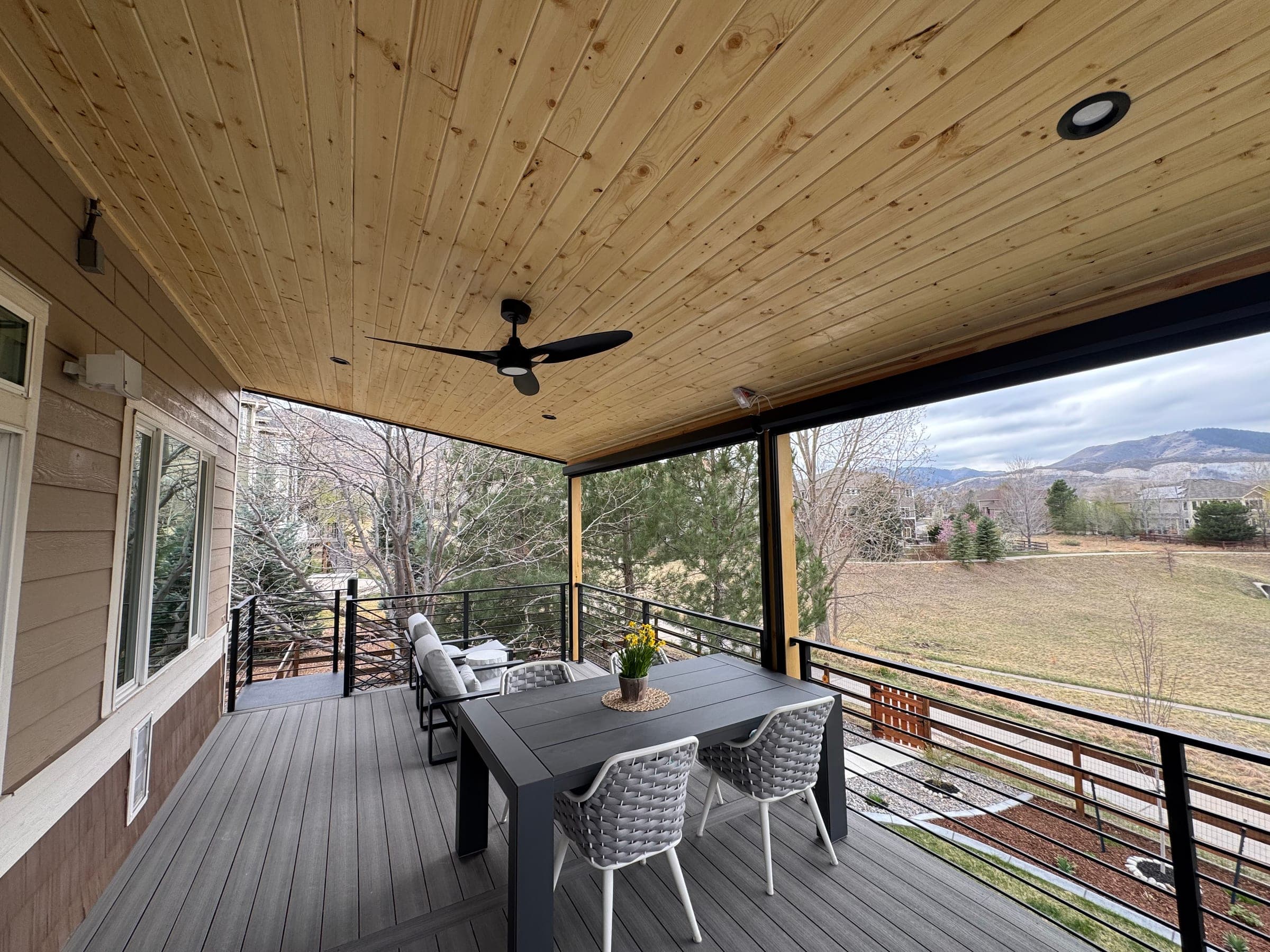 Covered Deck with Spiral Staircase in Greenwood Village, CO — gallery photo 9